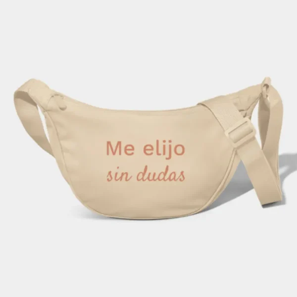 Riñonera color beige con la frase inspiradora ‘Me elijo sin dudas’ en letras terracota, diseño minimalista, artículo de merchandising de la Tienda Mente Uno disponible en Amazon, TeePublic y Spreadshirt
